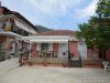 Outside photo ofe the house in centre of Parga with apartments and parking