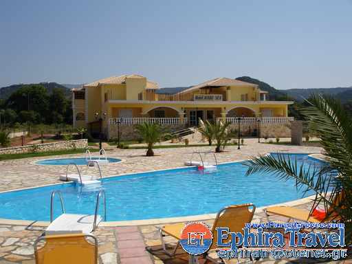 Karavostasi 4 star ApartHotel,only 200 meters from Karavostasi beach,with swimming pool and all comforts of a luxutius Hotel with kitchenette and breakfastbreakfast,playground for children.