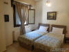 The first bedroom with 2 single beds of the Big apartment for 6-7 persons