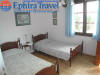 Photo of Ephira Travel for Kostira's House in Parga,The house,Parga Greece.a bedroom with two single beds