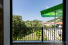 Views to olive gloves to the green and to Parga form the Balcony of the maisonette style apartment