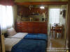 The seperate kitchen with 2 single beds of the Biger apartment X 4/5 persons
